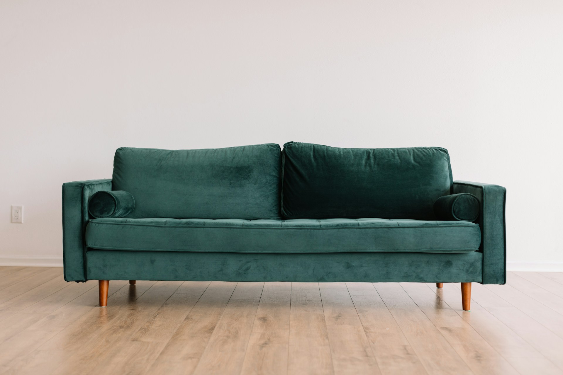 Curved sofa in a bright loft interior